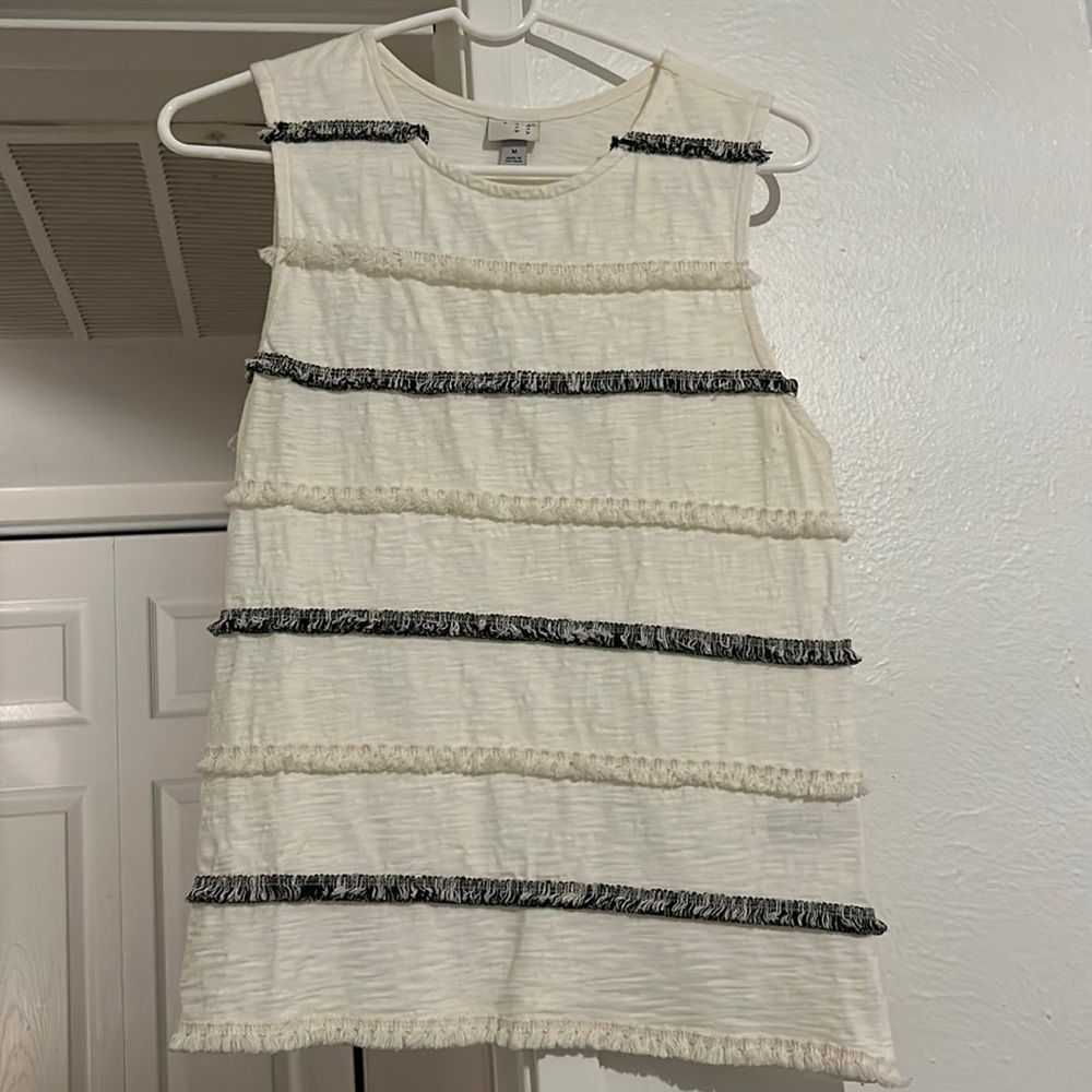 Light ruffle accent tank top
